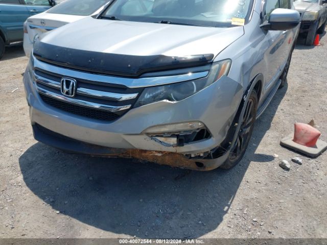 Photo 5 VIN: 5FNYF5H80GB033682 - HONDA PILOT 