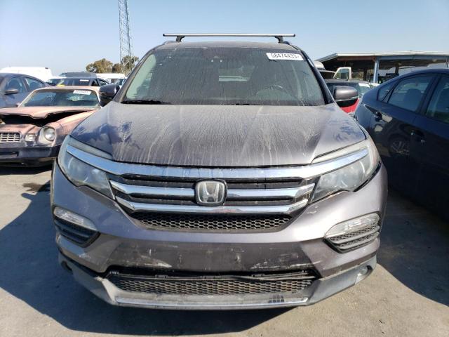 Photo 4 VIN: 5FNYF5H91GB033893 - HONDA PILOT TOUR 