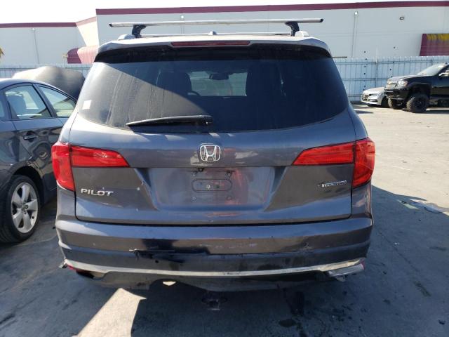 Photo 5 VIN: 5FNYF5H91GB033893 - HONDA PILOT TOUR 