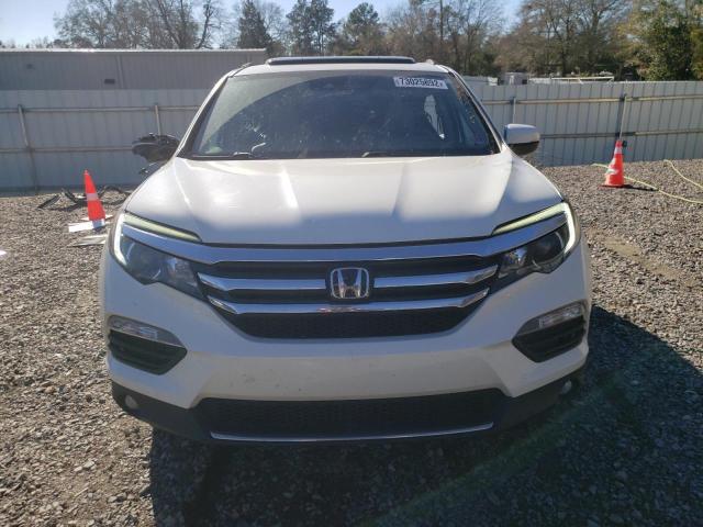 Photo 4 VIN: 5FNYF5H91GB051939 - HONDA PILOT TOUR 