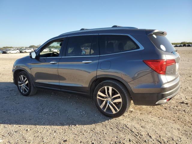 Photo 1 VIN: 5FNYF5H92GB054221 - HONDA PILOT TOUR 