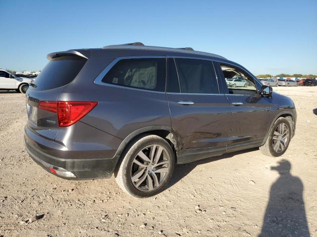 Photo 2 VIN: 5FNYF5H92GB054221 - HONDA PILOT TOUR 