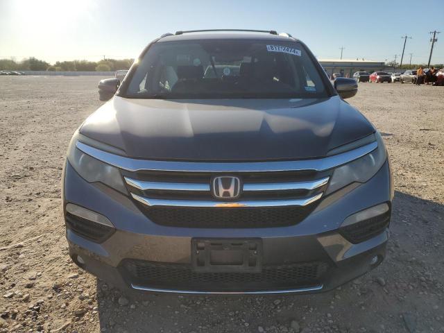 Photo 4 VIN: 5FNYF5H92GB054221 - HONDA PILOT TOUR 