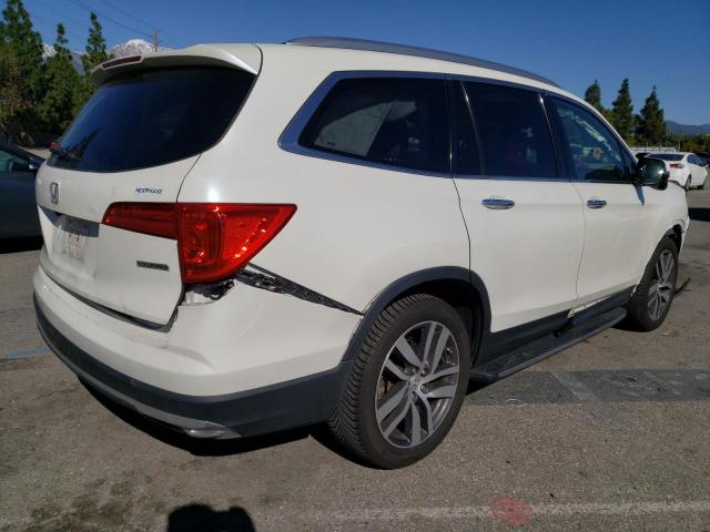 Photo 2 VIN: 5FNYF5H92HB017462 - HONDA PILOT TOUR 