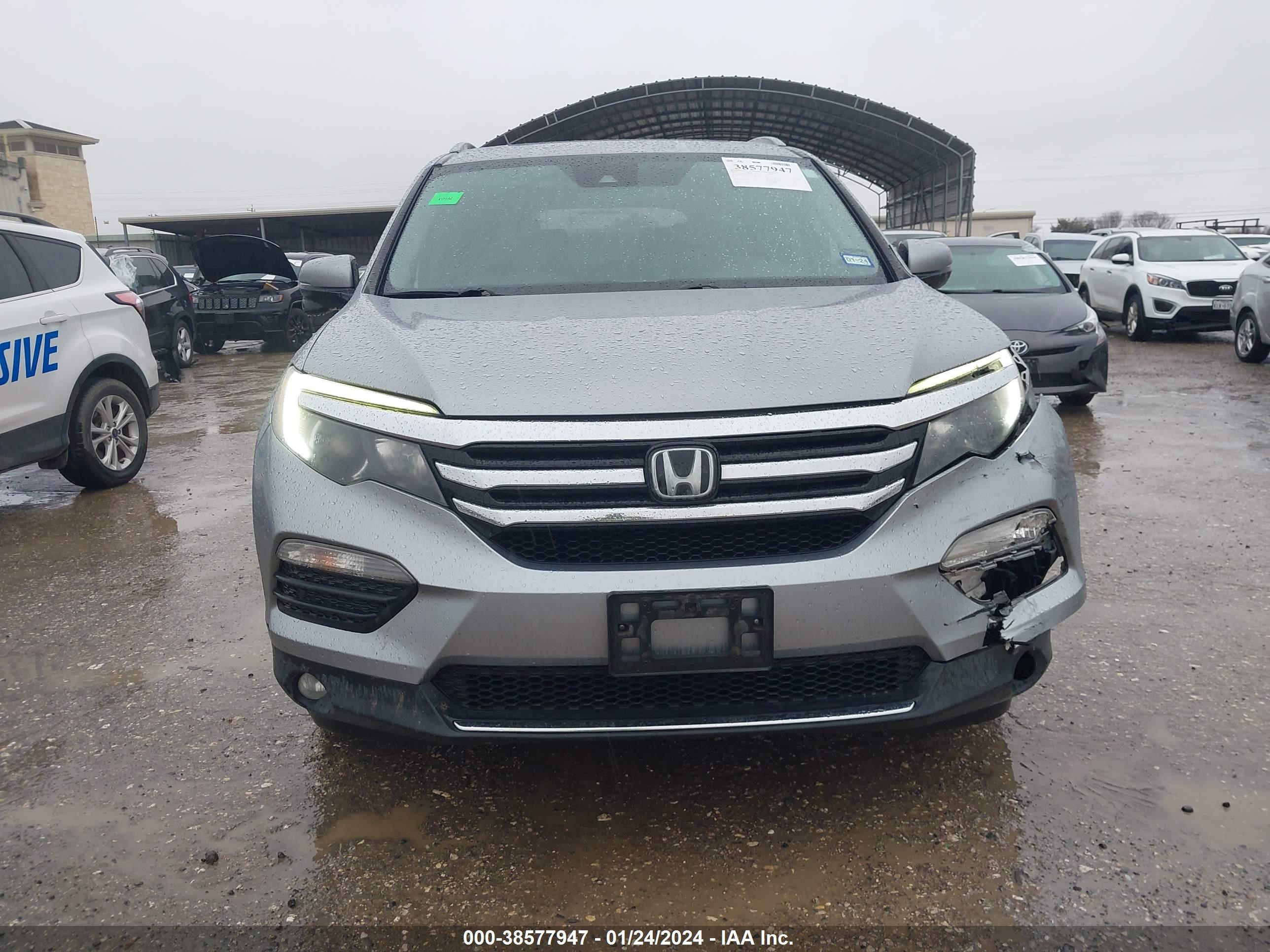 Photo 11 VIN: 5FNYF5H94HB028575 - HONDA PILOT 