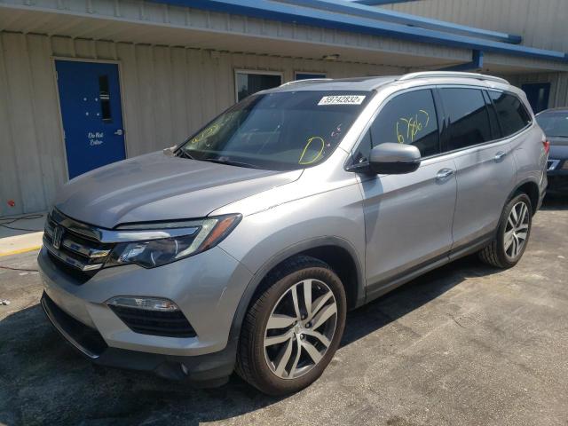 Photo 1 VIN: 5FNYF5H95GB031080 - HONDA PILOT TOUR 