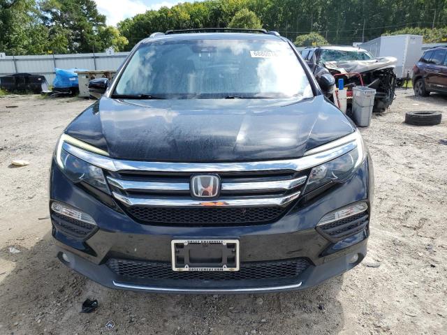 Photo 4 VIN: 5FNYF5H95HB026995 - HONDA PILOT TOUR 