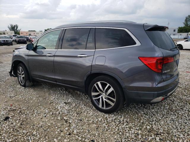 Photo 1 VIN: 5FNYF5H97GB043568 - HONDA PILOT TOUR 