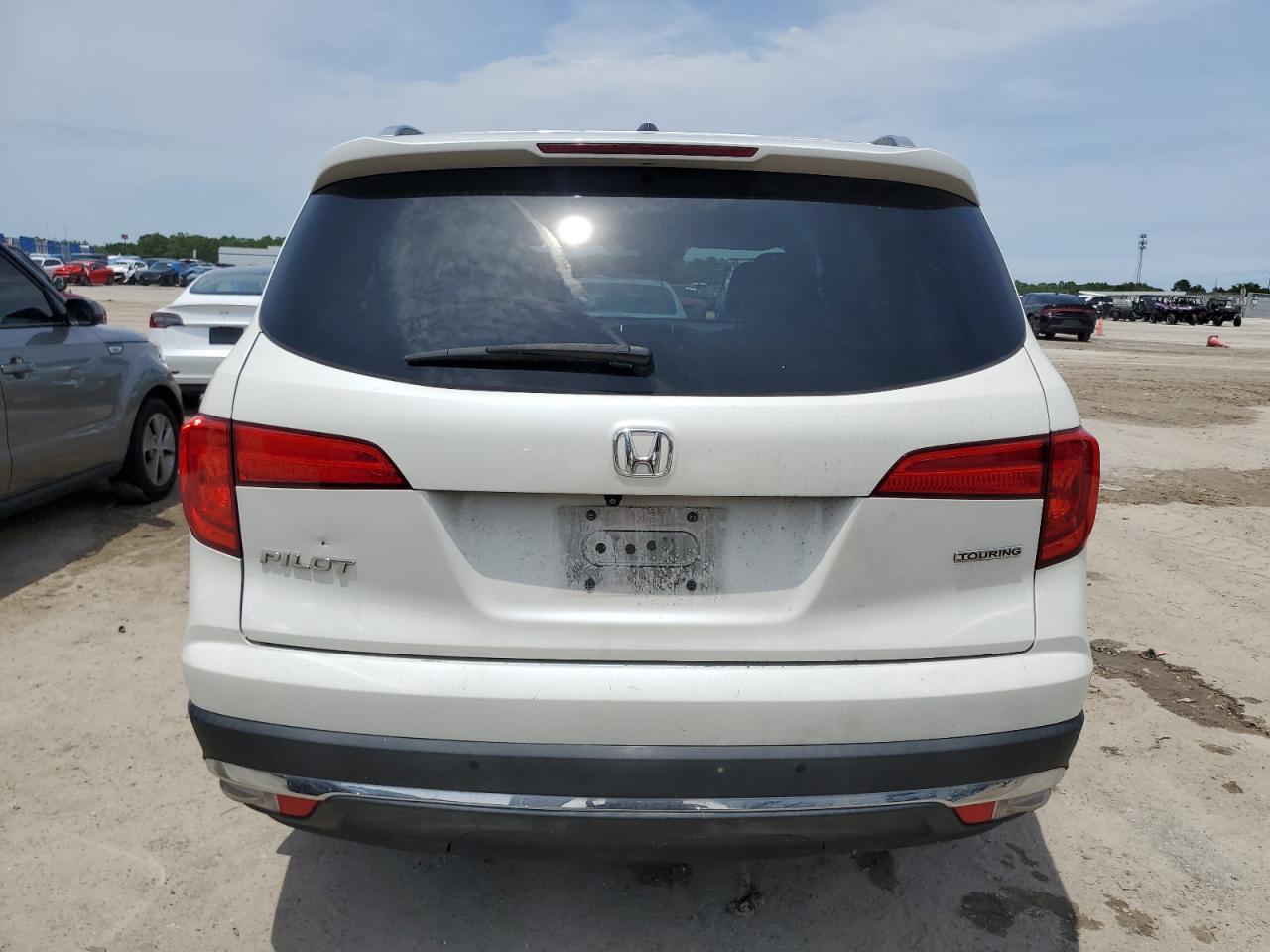 Photo 5 VIN: 5FNYF5H9XGB028787 - HONDA PILOT 