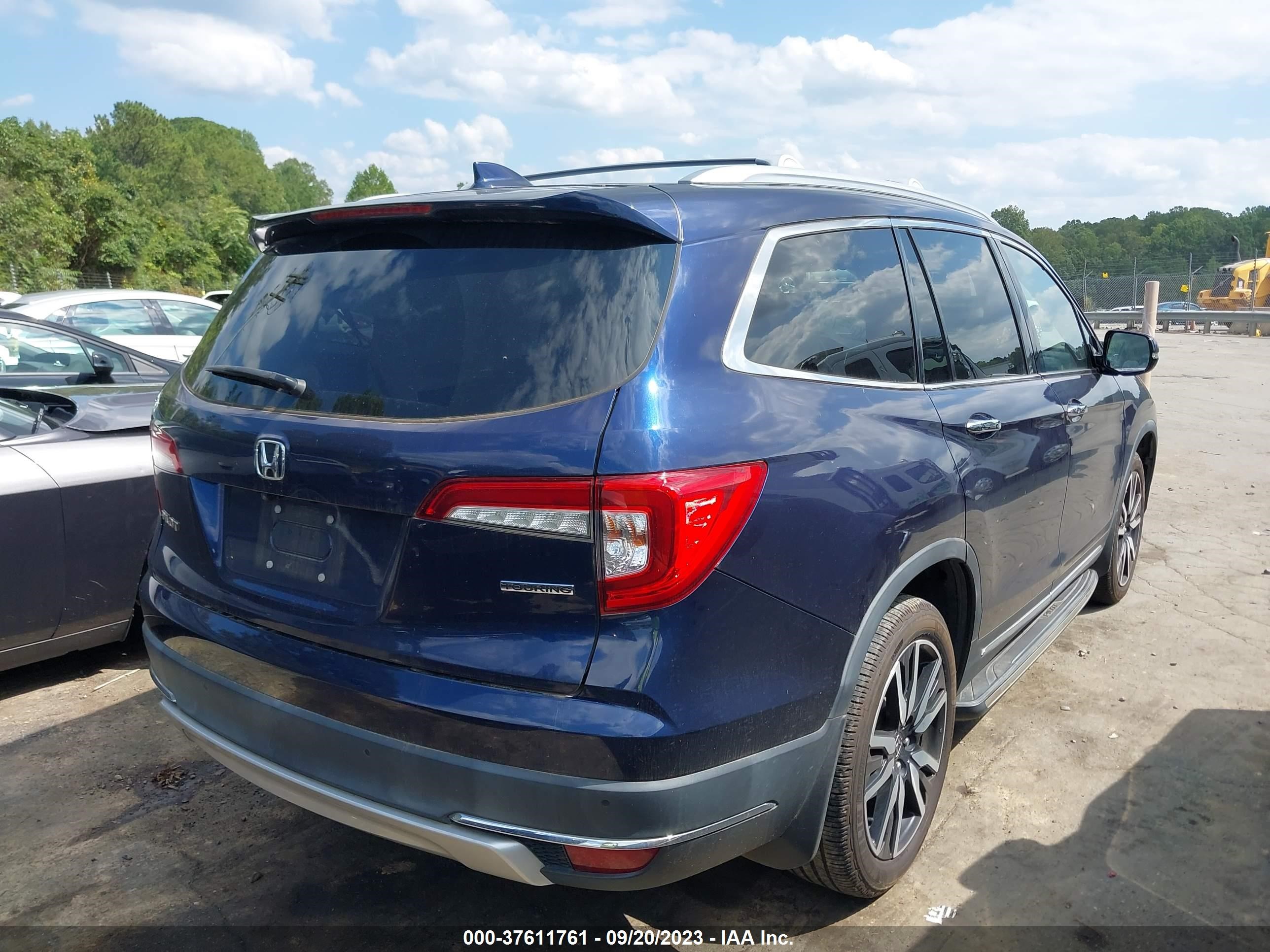 Photo 3 VIN: 5FNYF5H9XKB035876 - HONDA PILOT 