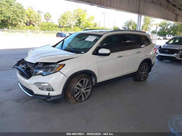 Photo 1 VIN: 5FNYF6H01GB066304 - HONDA PILOT 