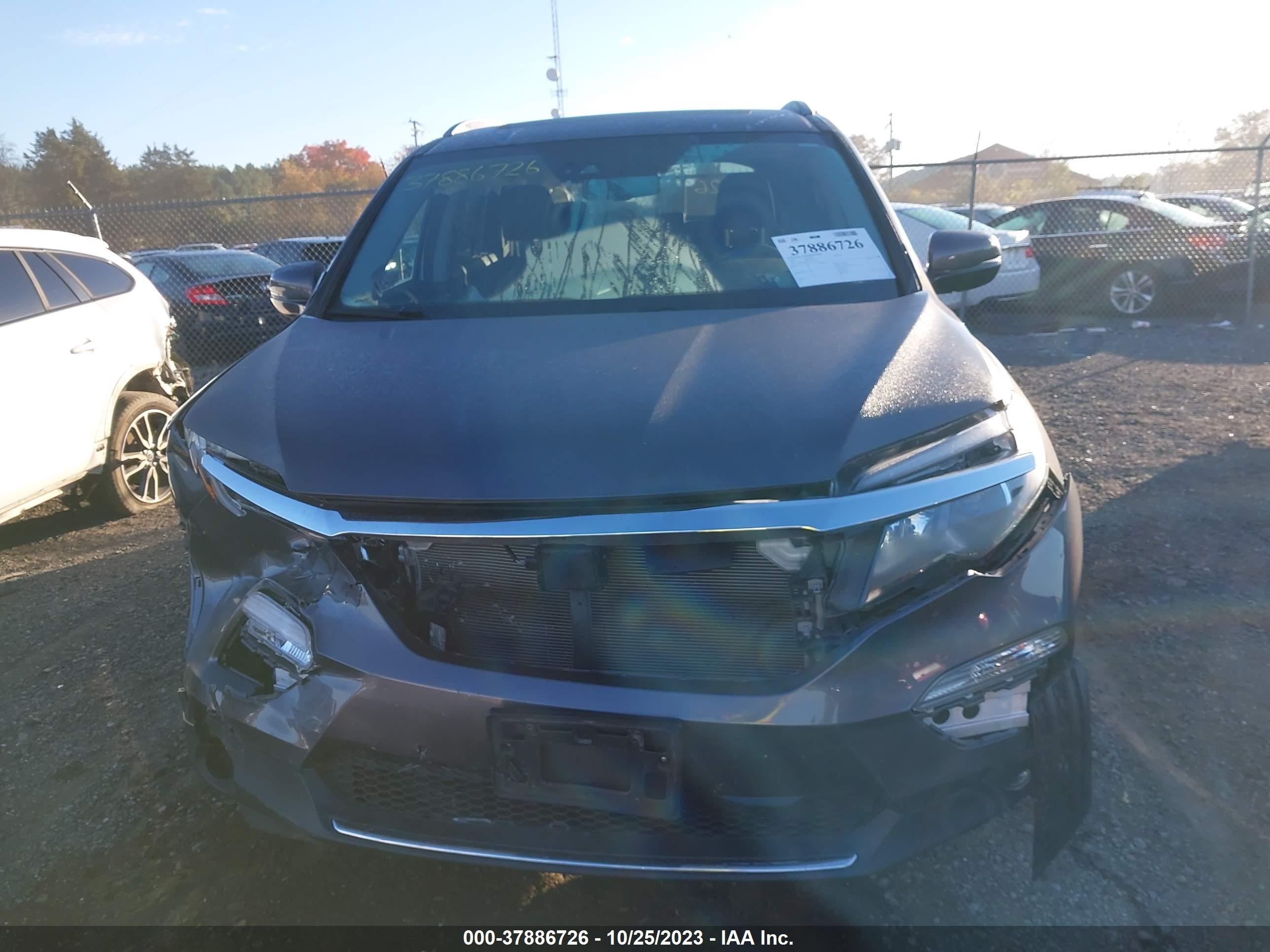 Photo 11 VIN: 5FNYF6H01HB077238 - HONDA PILOT 