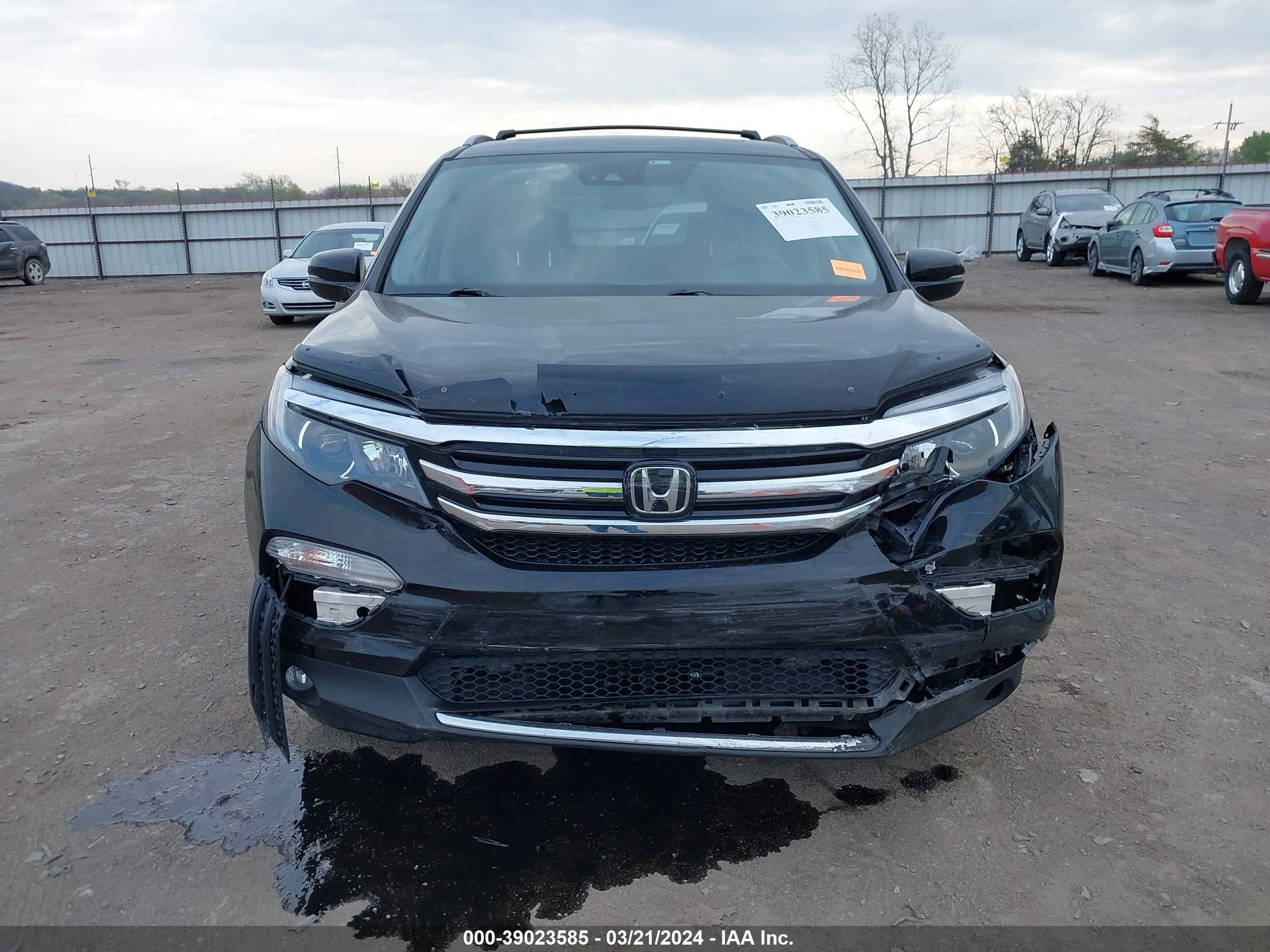 Photo 11 VIN: 5FNYF6H04GB090404 - HONDA PILOT 