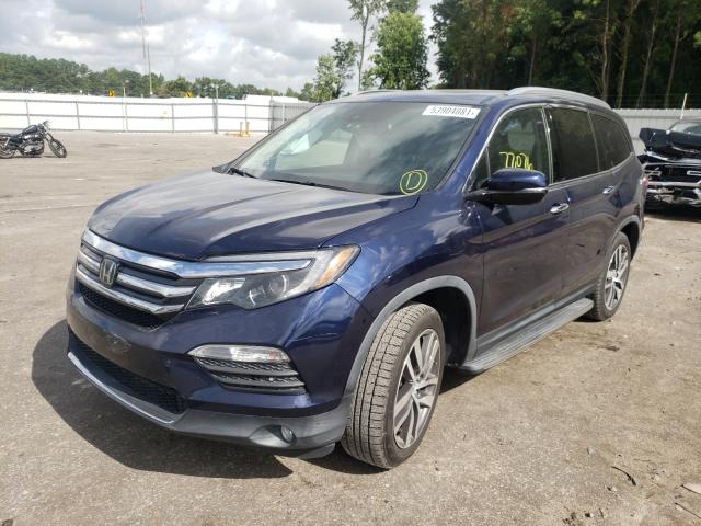 Photo 1 VIN: 5FNYF6H05GB061008 - HONDA PILOT ELIT 