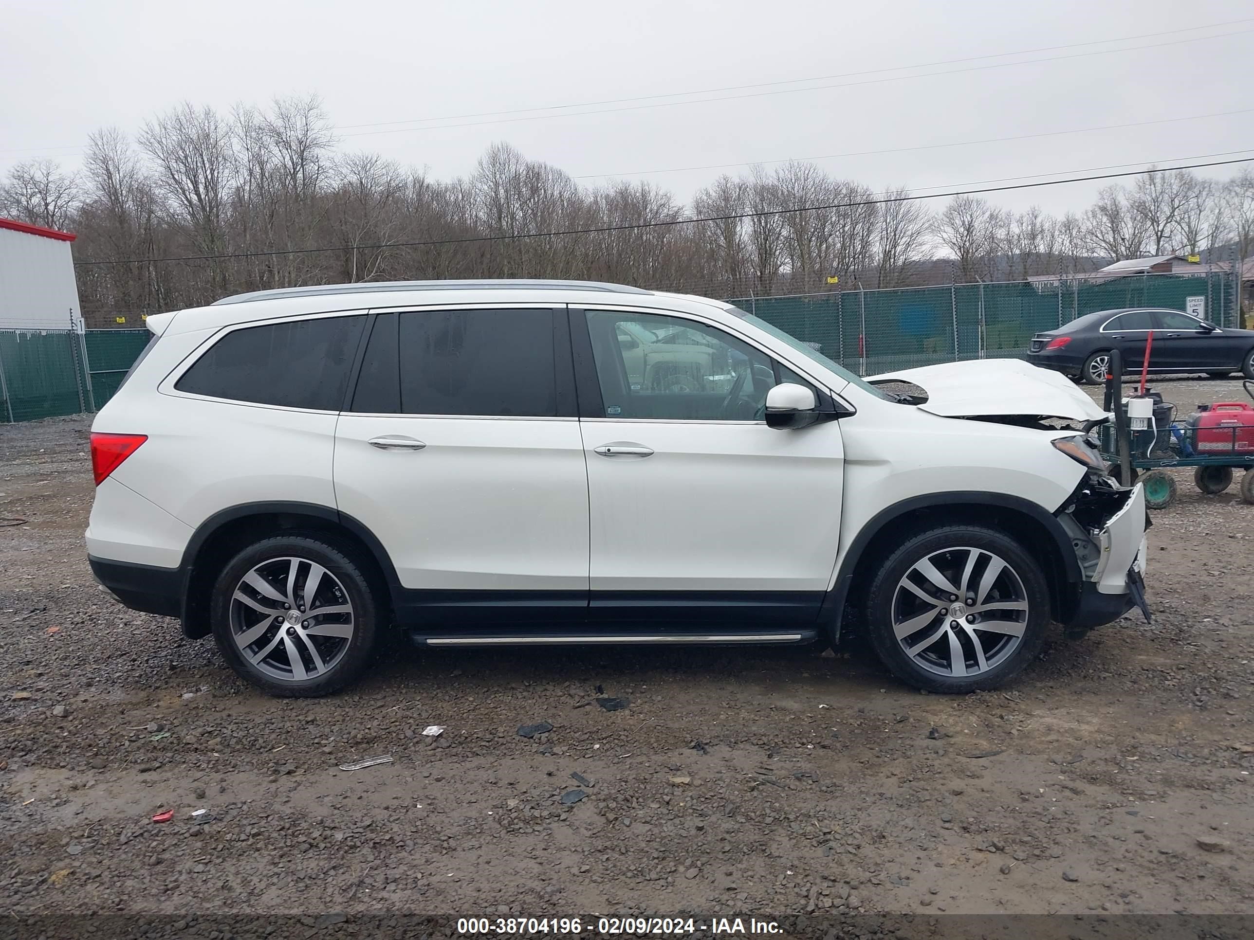 Photo 12 VIN: 5FNYF6H05HB063391 - HONDA PILOT 