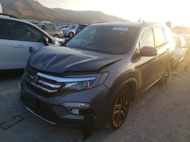 Photo 1 VIN: 5FNYF6H05HB069353 - HONDA PILOT ELIT 