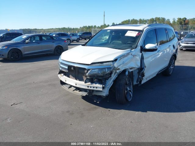 Photo 5 VIN: 5FNYF6H06GB056044 - HONDA PILOT 