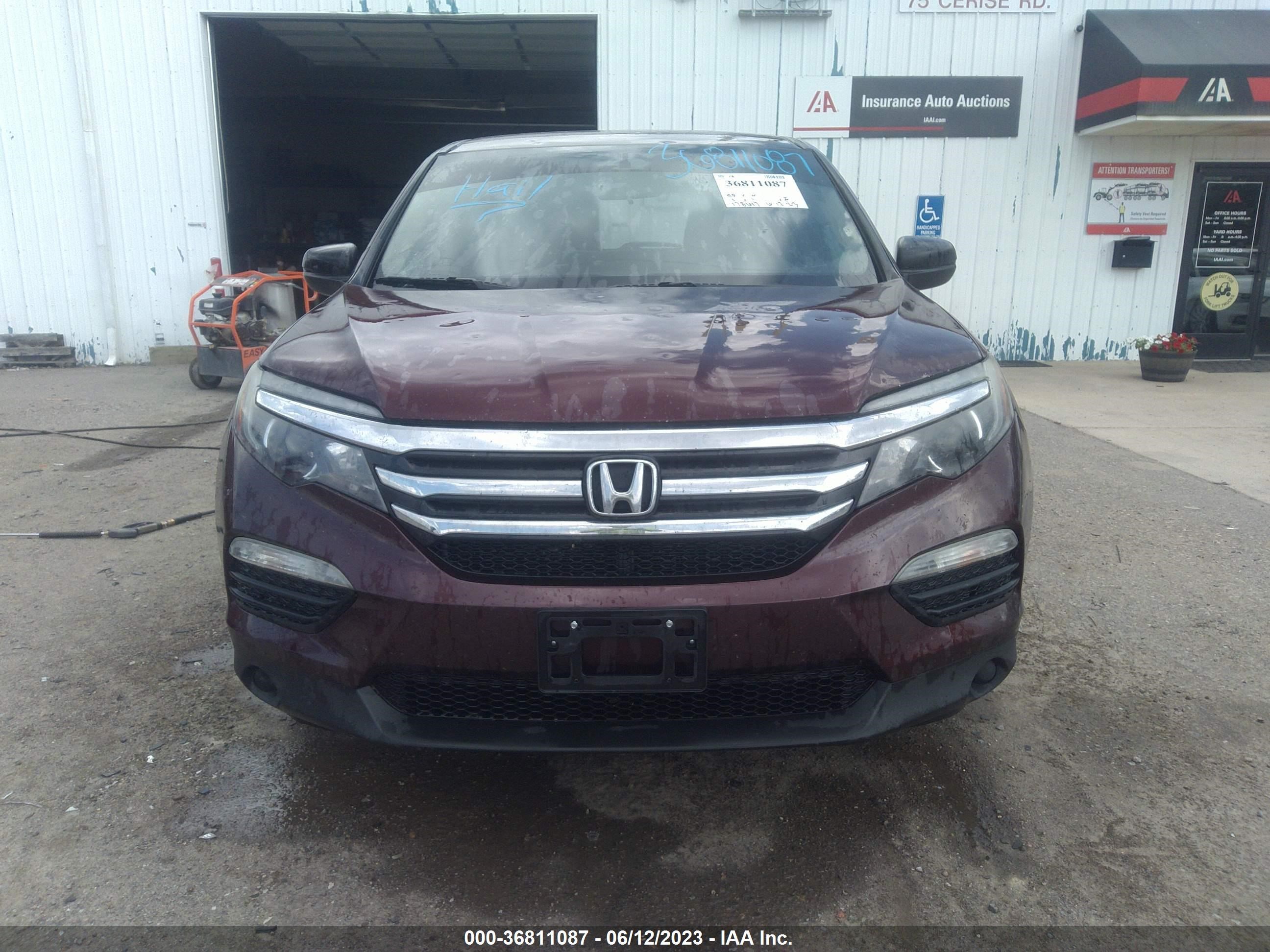 Photo 11 VIN: 5FNYF6H11GB109323 - HONDA PILOT 