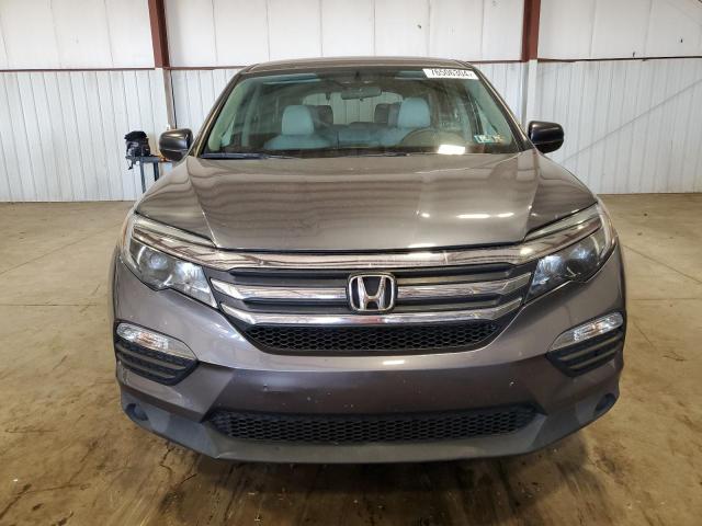 Photo 4 VIN: 5FNYF6H11GB112707 - HONDA PILOT LX 