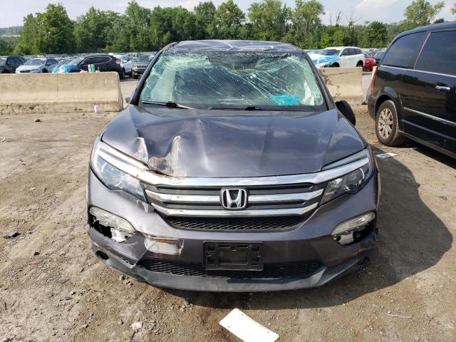 Photo 4 VIN: 5FNYF6H11GB127322 - HONDA PILOT LX 