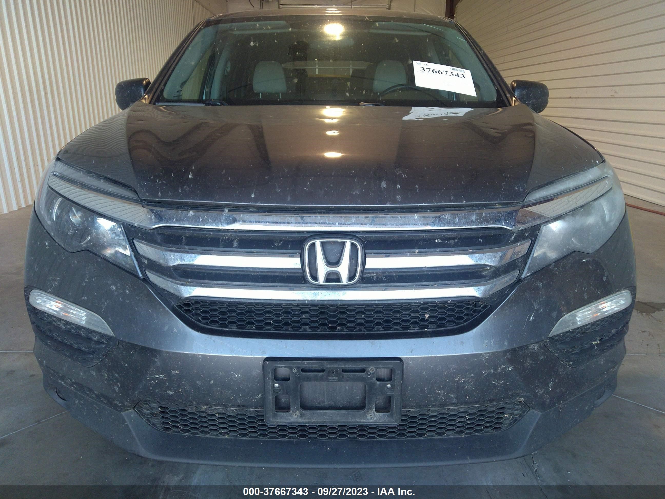 Photo 11 VIN: 5FNYF6H15GB094633 - HONDA PILOT 