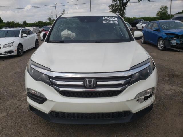 Photo 4 VIN: 5FNYF6H2XGB507087 - HONDA PILOT LX 