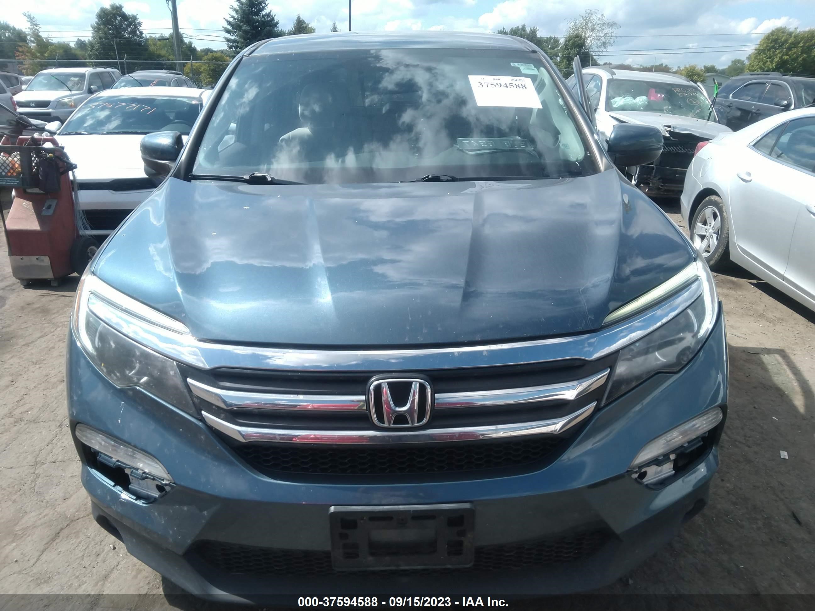 Photo 11 VIN: 5FNYF6H39GB058607 - HONDA PILOT 