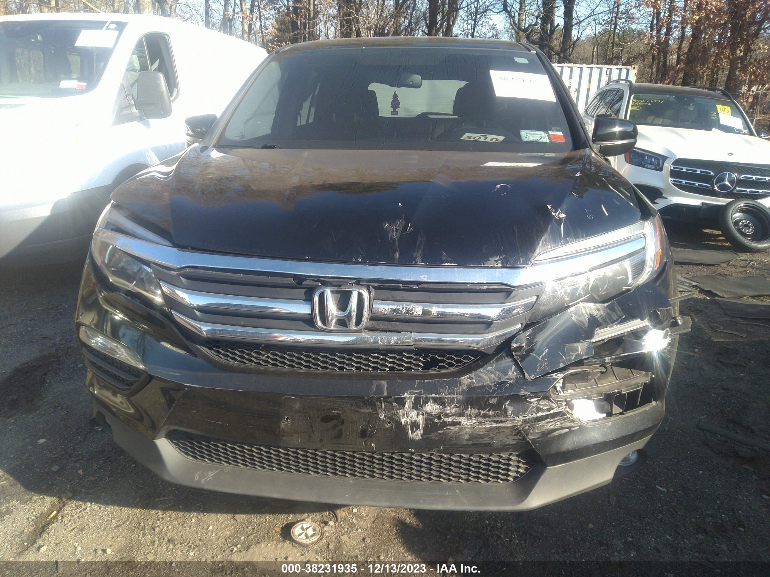 Photo 11 VIN: 5FNYF6H83GB085765 - HONDA PILOT 