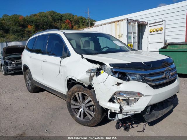 Photo 5 VIN: 5FNYF6H87GB124504 - HONDA PILOT 