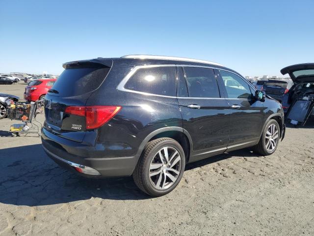 Photo 2 VIN: 5FNYF6H90GB077874 - HONDA PILOT TOUR 