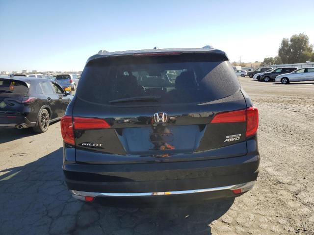 Photo 5 VIN: 5FNYF6H90GB077874 - HONDA PILOT TOUR 