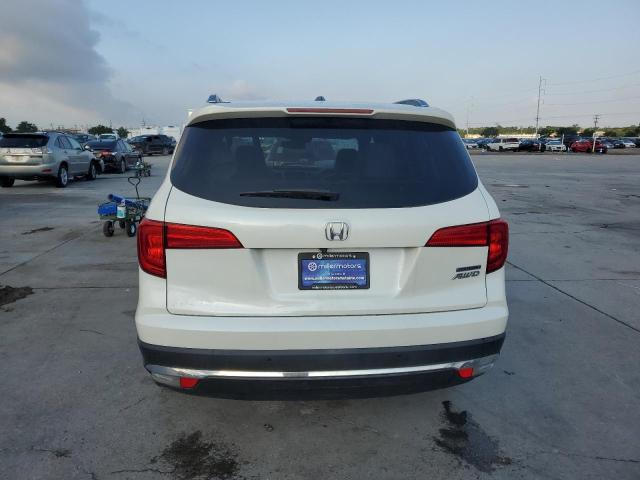 Photo 5 VIN: 5FNYF6H90GB116544 - HONDA PILOT TOUR 