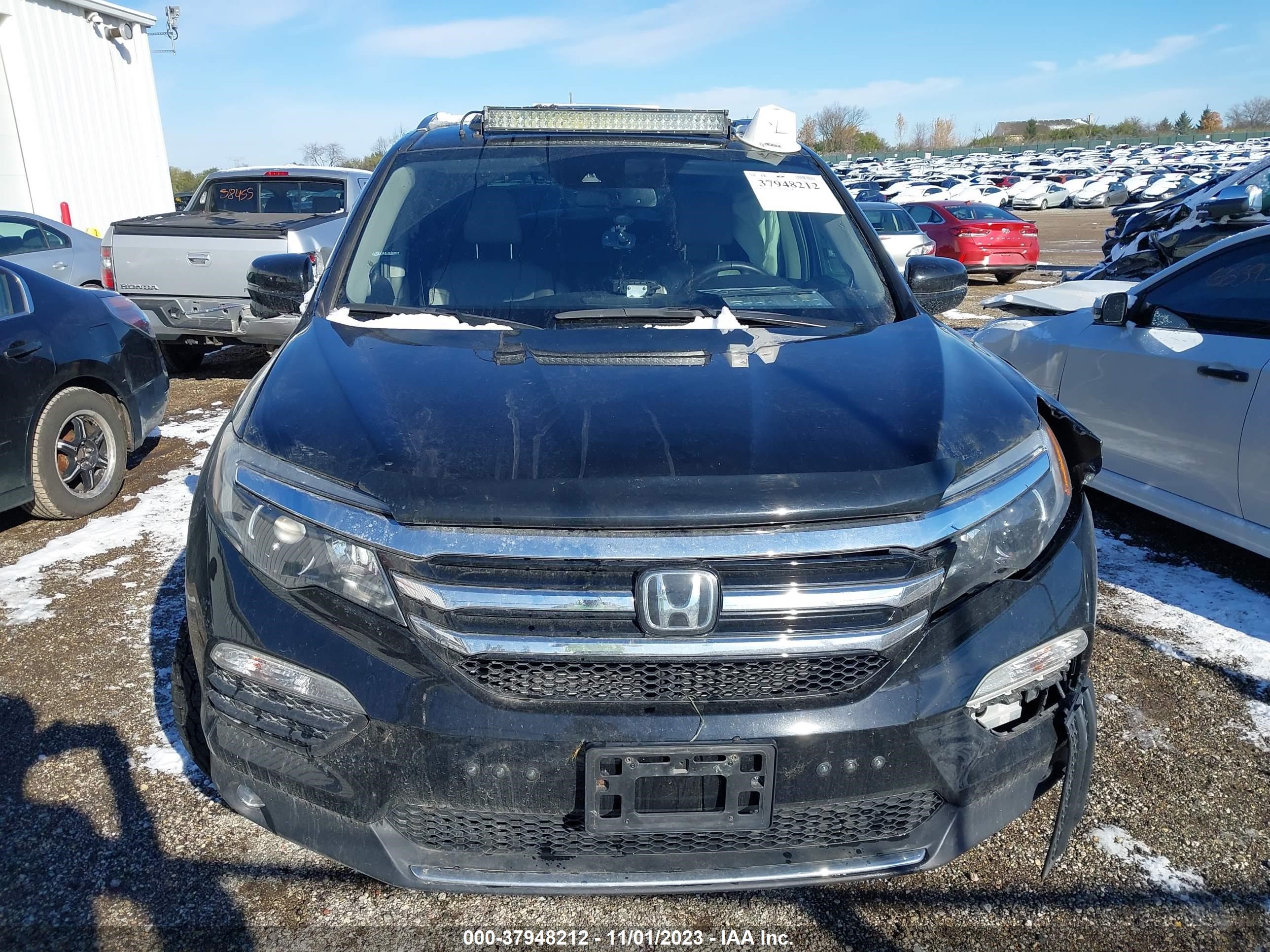 Photo 11 VIN: 5FNYF6H90HB063720 - HONDA PILOT 