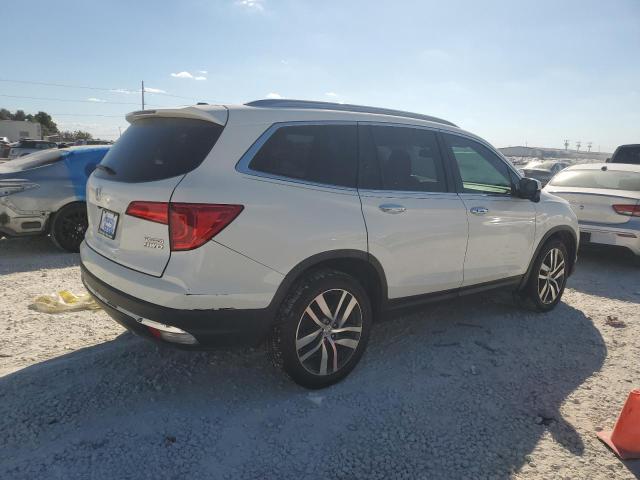 Photo 2 VIN: 5FNYF6H90HB089380 - HONDA PILOT TOUR 