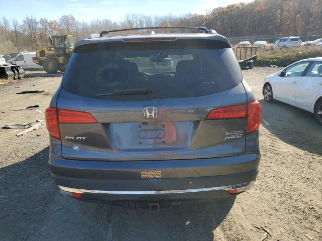 Photo 5 VIN: 5FNYF6H91GB020910 - HONDA PILOT TOUR 