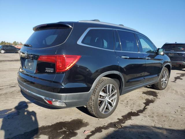 Photo 2 VIN: 5FNYF6H91GB127763 - HONDA PILOT TOUR 