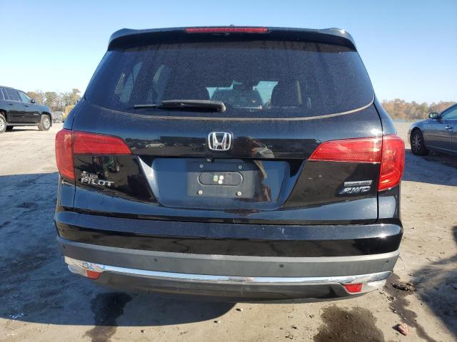 Photo 5 VIN: 5FNYF6H91GB127763 - HONDA PILOT TOUR 