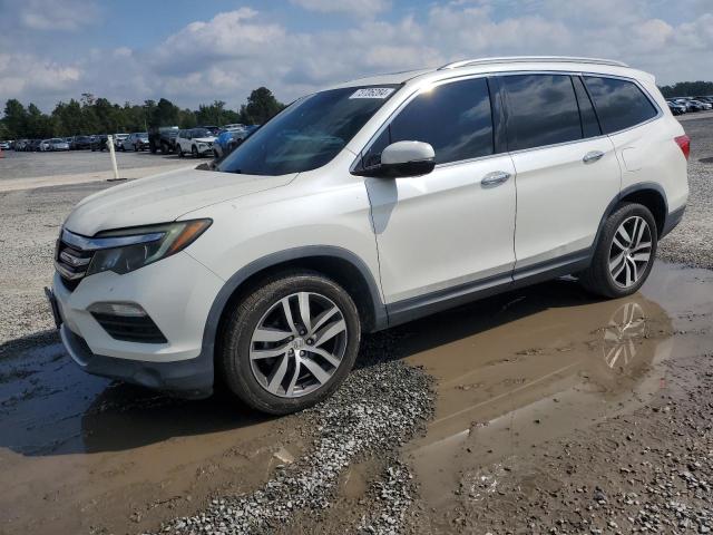 Photo 0 VIN: 5FNYF6H92GB056315 - HONDA PILOT TOUR 