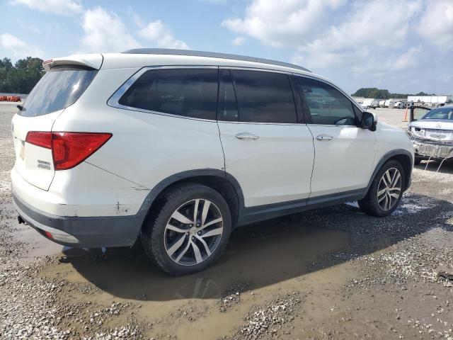 Photo 2 VIN: 5FNYF6H92GB056315 - HONDA PILOT TOUR 