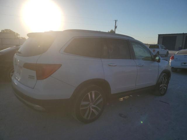 Photo 2 VIN: 5FNYF6H92GB120210 - HONDA PILOT TOUR 