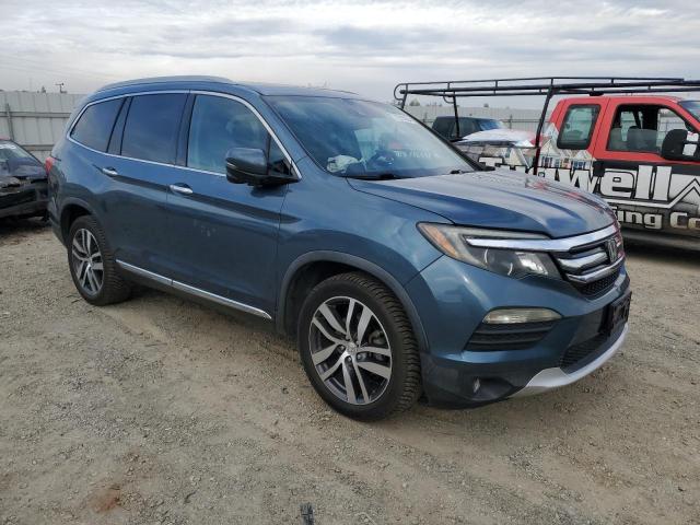 Photo 3 VIN: 5FNYF6H94GB070300 - HONDA PILOT TOUR 