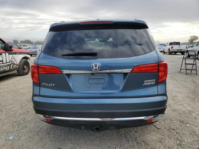 Photo 5 VIN: 5FNYF6H94GB070300 - HONDA PILOT TOUR 