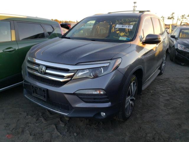 Photo 1 VIN: 5FNYF6H99GB125551 - HONDA PILOT TOUR 