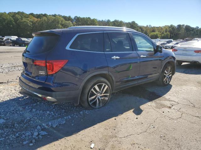 Photo 2 VIN: 5FNYF6H9XGB122478 - HONDA PILOT TOUR 