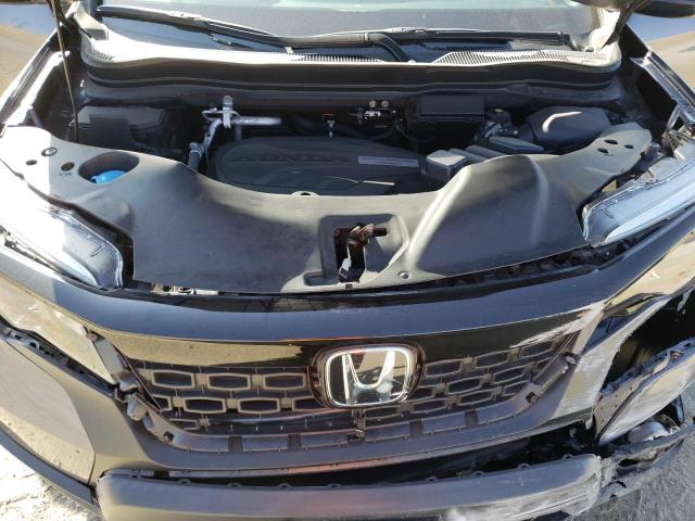 Photo 11 VIN: 5FNYF7H22KB010257 - HONDA PASSPORT S 