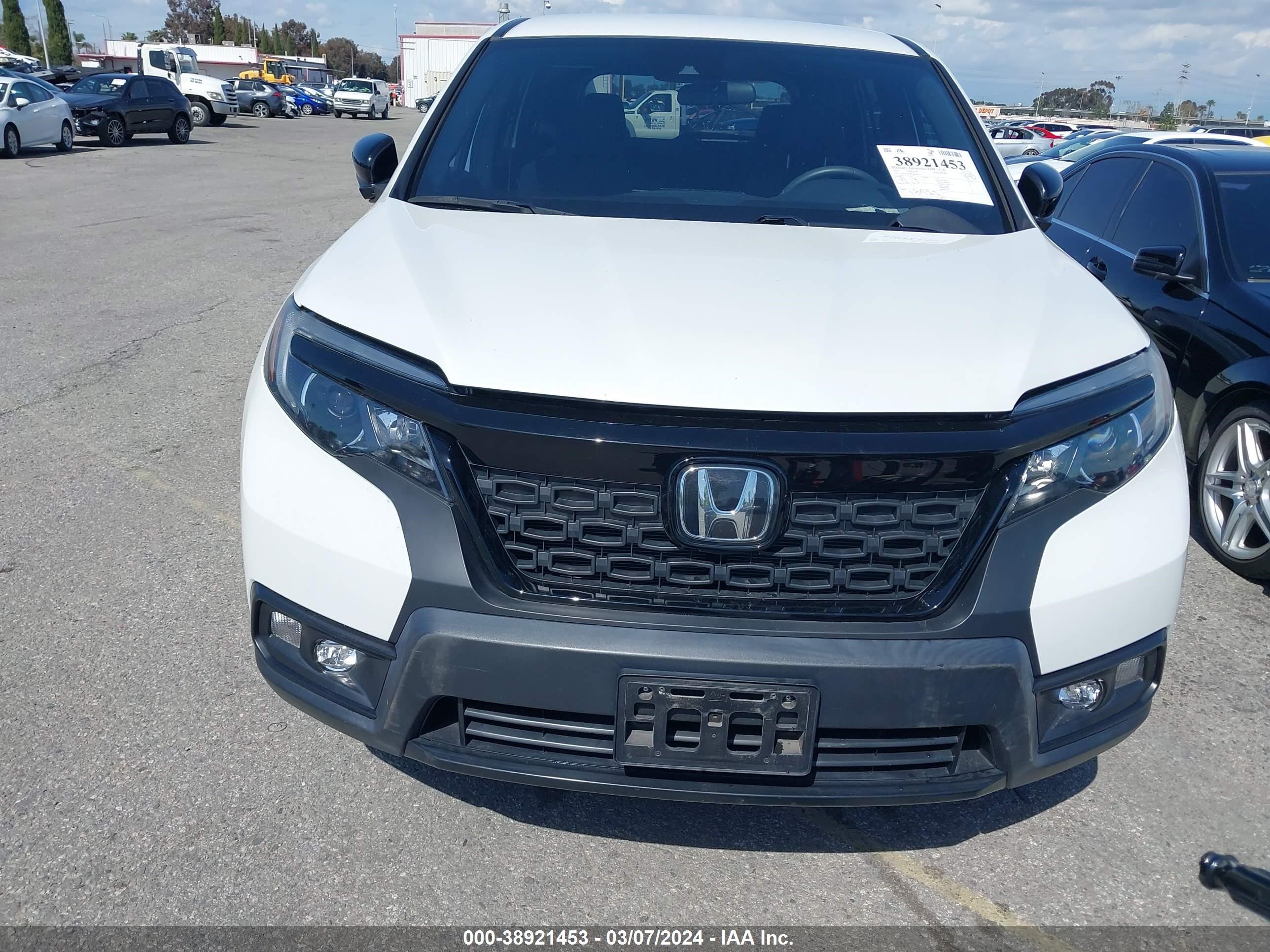 Photo 11 VIN: 5FNYF7H28KB009713 - HONDA PASSPORT 