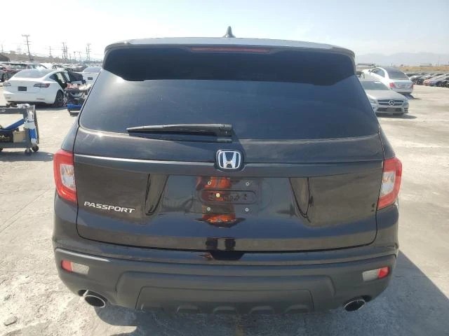 Photo 5 VIN: 5FNYF7H50KB010901 - HONDA PASSPORT E 