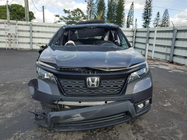 Photo 4 VIN: 5FNYF7H52LB001568 - HONDA PASSPORT E 