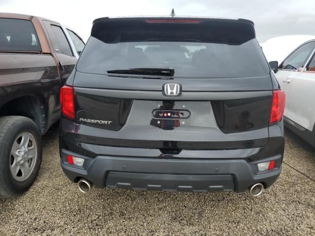 Photo 5 VIN: 5FNYF7H52NB005140 - HONDA PASSPORT E 