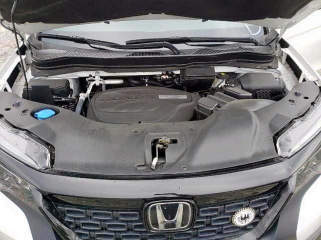 Photo 6 VIN: 5FNYF7H54LB000101 - HONDA PASSPORT E 